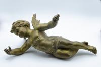 A French gilt bronze cherub. Ca 1900.